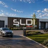 Locaux d'activités A VENDRE OU A LOUER - GUEREINS - 1 677 m²